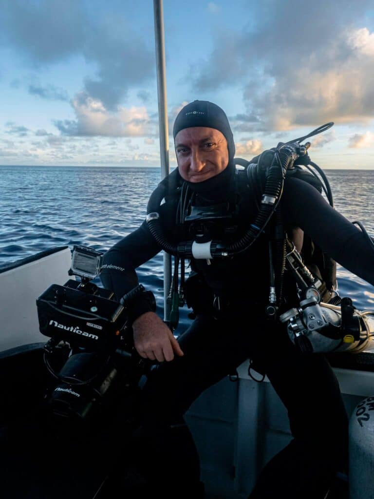 Underwater camera operator Richard Brooks with rebreather before a dive