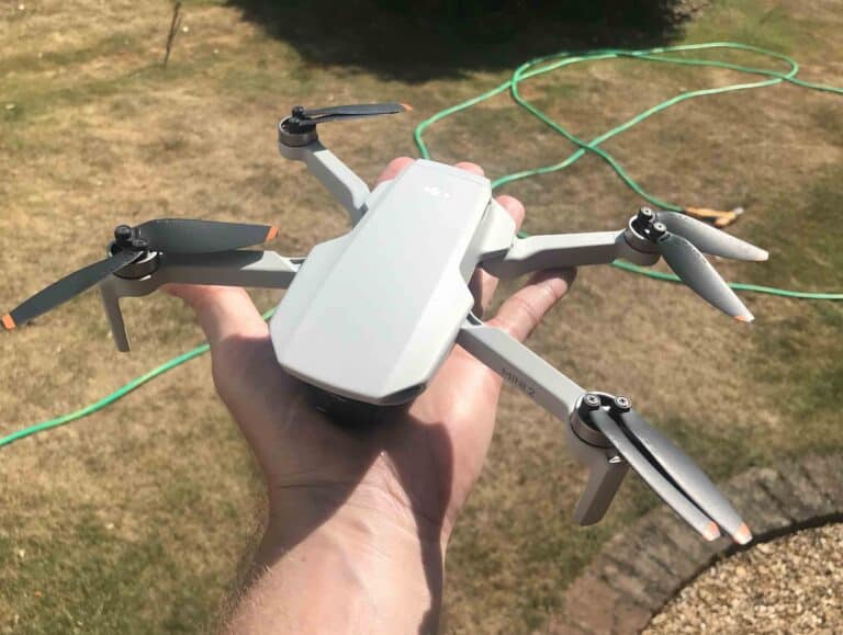 Small Drone. DJI Mini 2 resting on the palm of a hand